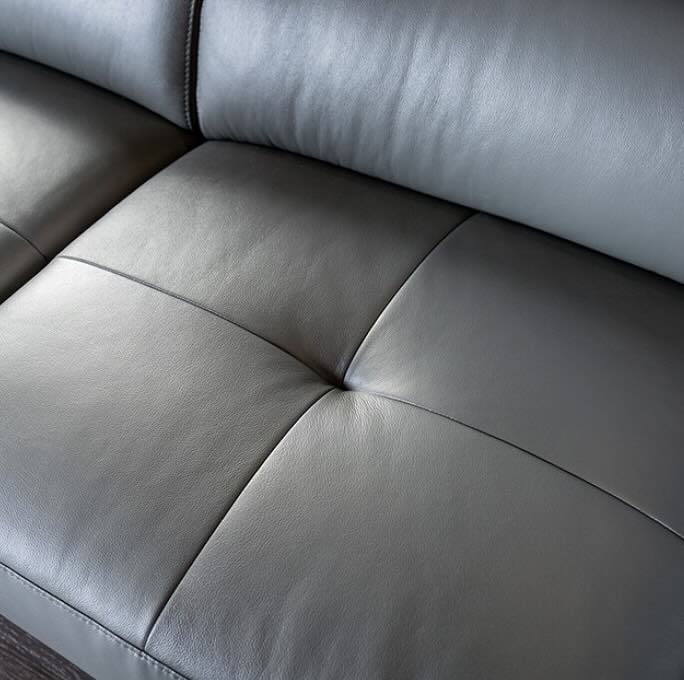 Vadso Modern Leather Sectional with Track Arms & Adjustable Head Rest - Dark Gray